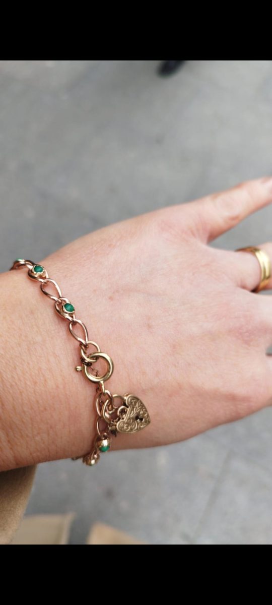Bracelet with heart pendant and green stones